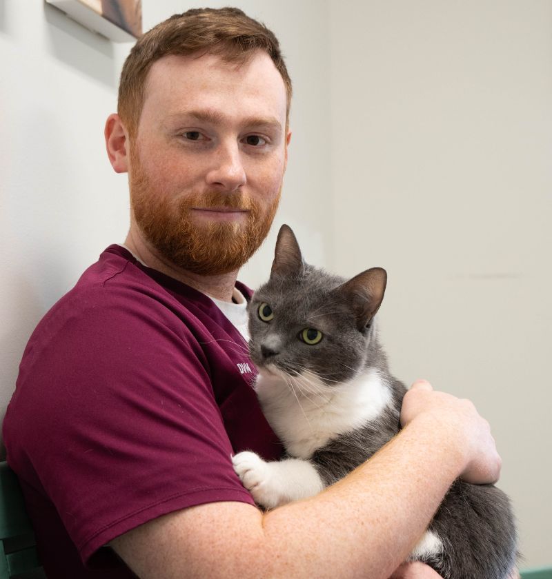 Michael Giard holding a cat